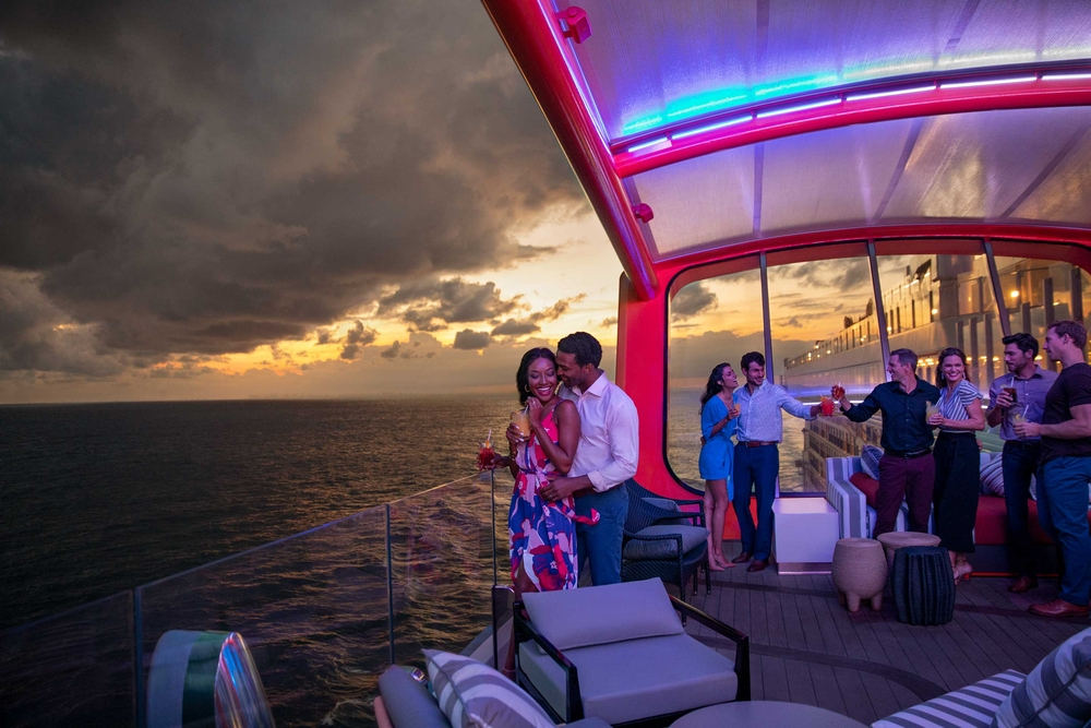 Nighttime social scene at a cruise ship lounge